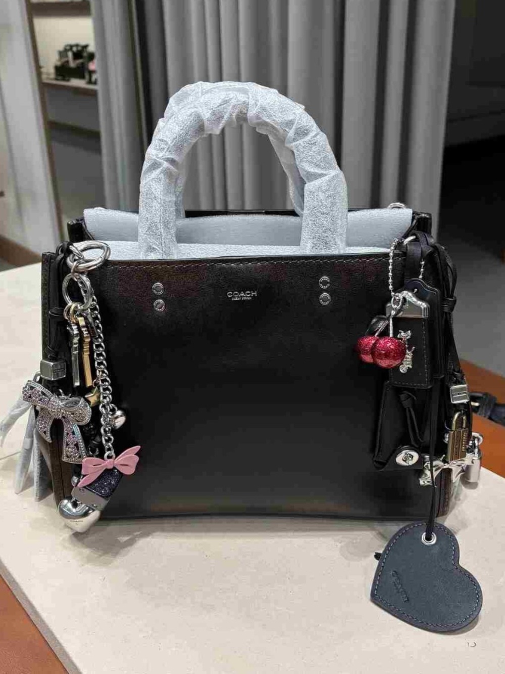 NWT Loved Leather Rogue 31 with all charms